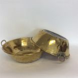 A good pair of large brass cream pails on domed ba