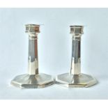 A pair of engine turned piano candlesticks. Birmin