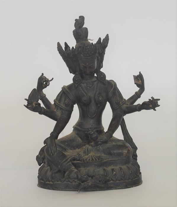 A cast bronze figure of the Goddess Durga. Est. £1