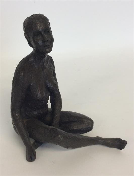 A figure of a naked lady with textured body in sea