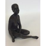 A figure of a naked lady with textured body in sea