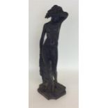 A limited edition sculpture of a naked lady with w