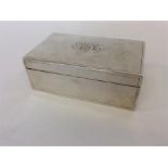 A Chinese silver cigarette box with textured body,