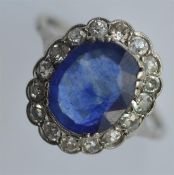 A good Antique sapphire and diamond oval cluster r