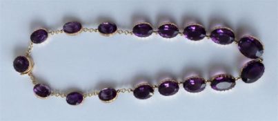 A good Antique 17 stone amethyst necklace with lar