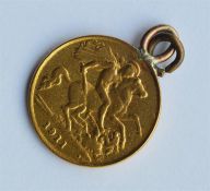 A 1911 half sovereign mounted as a pendant with lo