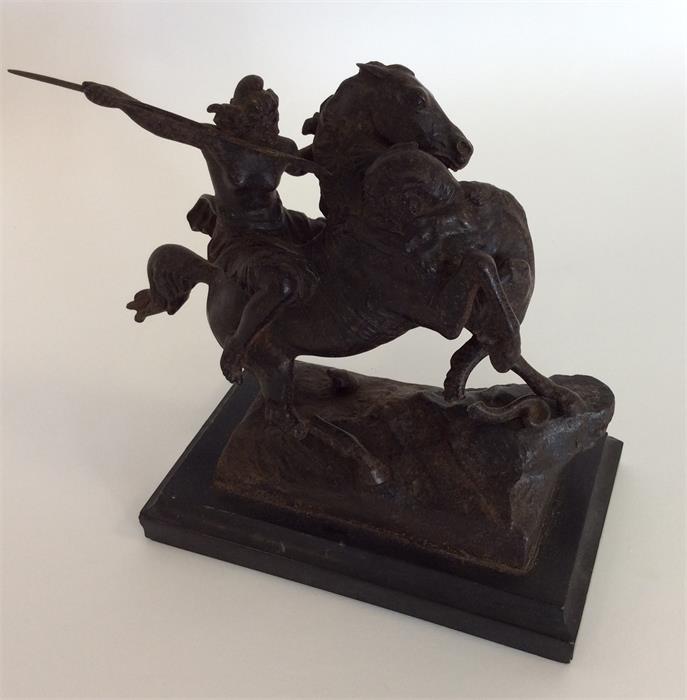 A cast bronze figure of a warrior on horseback mou