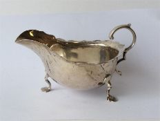 An Adams' style sauce boat, the body mounted with
