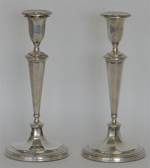 A tall pair of candlesticks with panelled sides an - Image 3 of 3