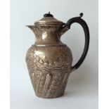 A stylish hot water jug decorated with flowers, sc