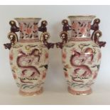 A pair of tall Masons vases with gilt tops. Est. £