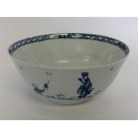 An early English pottery bowl with blue glazing. A