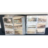 A large folder containing postcards. Est. £30 - £4