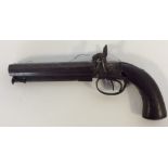 An Antique flintlock double barrelled pistol with