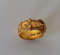An 18 carat Antique buckle ring. Birmingham 1899.