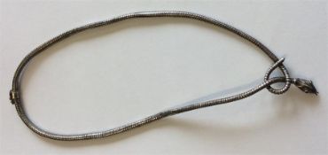 An attractive silver collar in the form of an entw