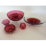 A collection of cranberry glass. Est. £20 - £30.