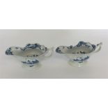 A pair of early English blue and white sauce boats