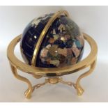 An unusual modern brass mounted globe. Est. £30 -