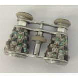 A pair of MOP mounted opera glasses. Est. £20 - £3