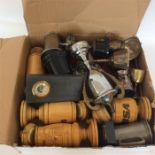 A quantity of old motor cycling trophies and cups.