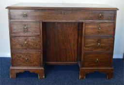 A large Georgian twin pedestal desk on bracket fee