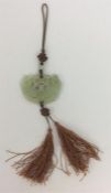 A good carved jade pendant with tassel drop. Est.