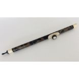 A Continental opium pipe with inlaid decoration. E