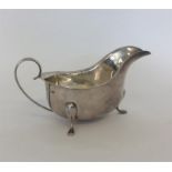 A heavy sauce boat with plain handle. Birmingham.