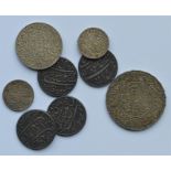 A group of early Islamic coins. Est. 330 - £50.