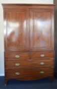 A good Victorian mahogany linen press with panelle