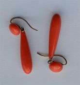 A pair of graduated coral drop earrings in high ca