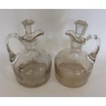 A pair of Antique glass ewers with gilded rims. Es