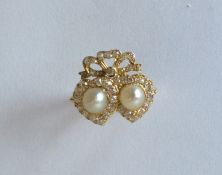 A large Edwardian pearl and diamond double heart r