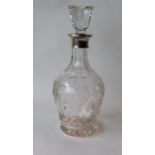 A good glass decanter, the body etched with flower