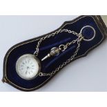 An unusual cased crystal ball watch mounted on sus