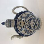 A Chinese blue and white teapot. Est. £50 - £60.