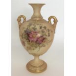 A Royal Worcester baluster shaped vase with gilded