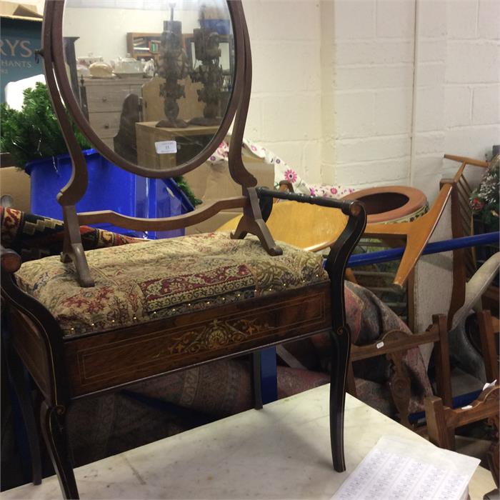 A rosewood piano stool together with a mirror.