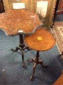 Two pedestal tables.