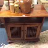 A Continental hardwood side table.