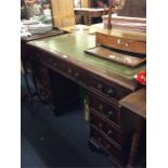 A mahogany twin pedestal desk.