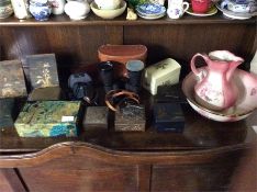 A collection of cigarette boxes, binoculars etc.
