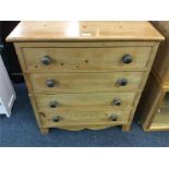 A pine hinged top commode.