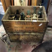 Old bottle crates and bottles.