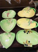 A collection of Carlton ware leaf dishes.