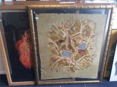 A group of three large gilt framed Balinese silks.