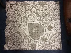 A large Madeira lace tablecloth. Approx. 9 ft x 5f