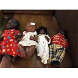 Four black dolls.