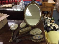 A brass mounted dressing table set.